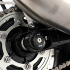 Swingarm Protectors for the Triumph Thruxton 1200 '16-, Thruxton 1200R '16-, Triumph Street Twin '16-, Speed Twin 1200 '19-'21, Scrambler 1200 XC/XE '19-, Speed Twin 900 '22- '24, Bonneville bobber '21- & Scrambler 900 '23-